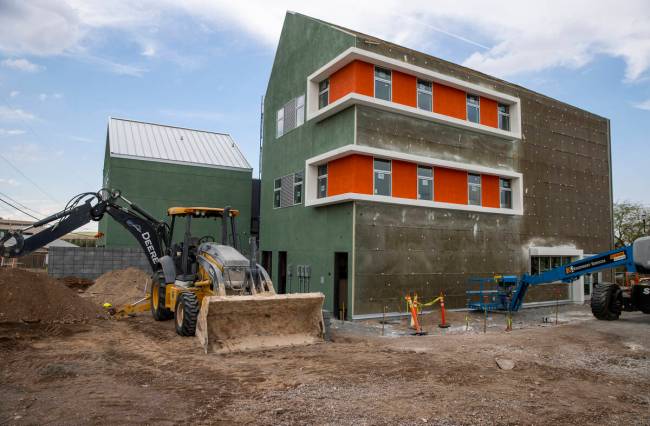 Construction continues about the small mixed-use complex Windom Kimsey of TSK Architects is dev ...
