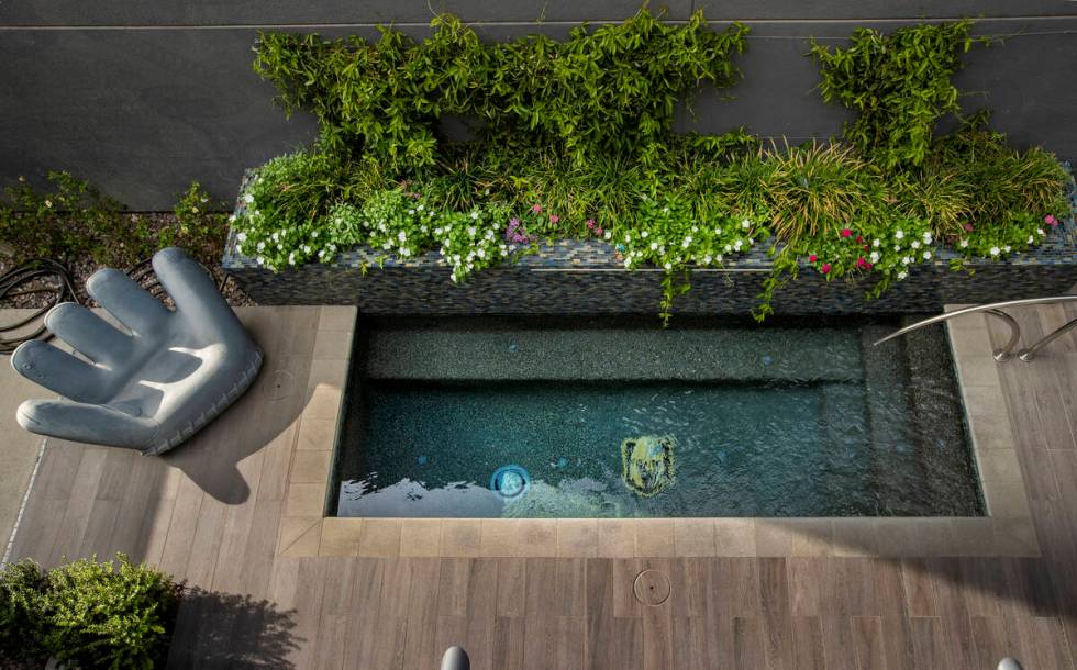 Soaking pool on the deck of Windom Kimsey of TSK Architects who is developing a small mixed-use ...
