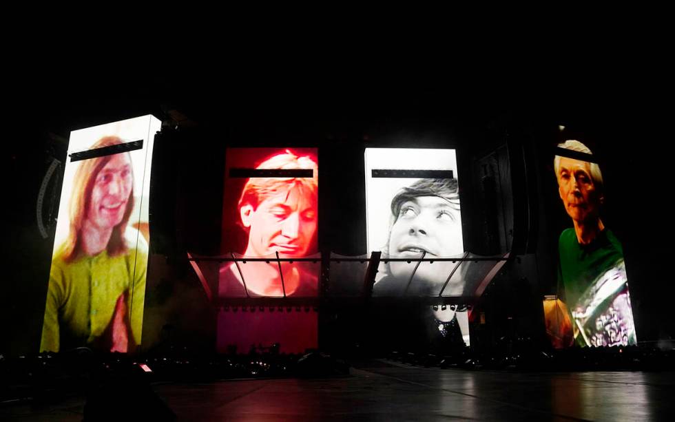 A video tribute to the late Rolling Stones drummer Charlie Watts is displayed onstage before th ...
