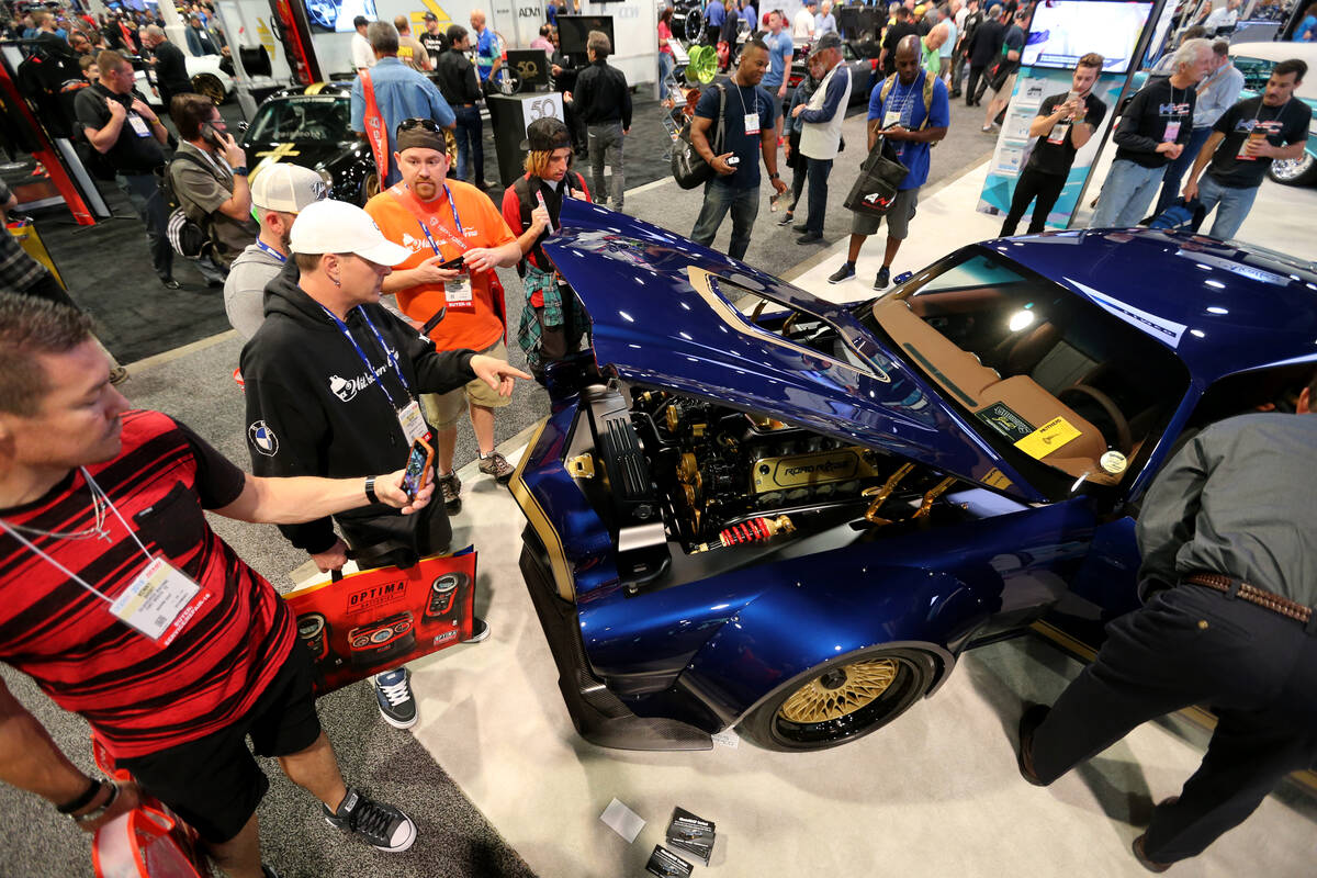 Conventioneers check out BASF Automotive Refinish Coatings booth at the Specialty Equipment Mar ...