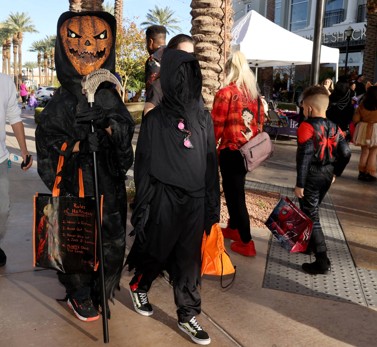 Isaiah, 11, left, and Isaac Scott, 10, of North Las Vegas during the Halloween Ghost Walk at Th ...