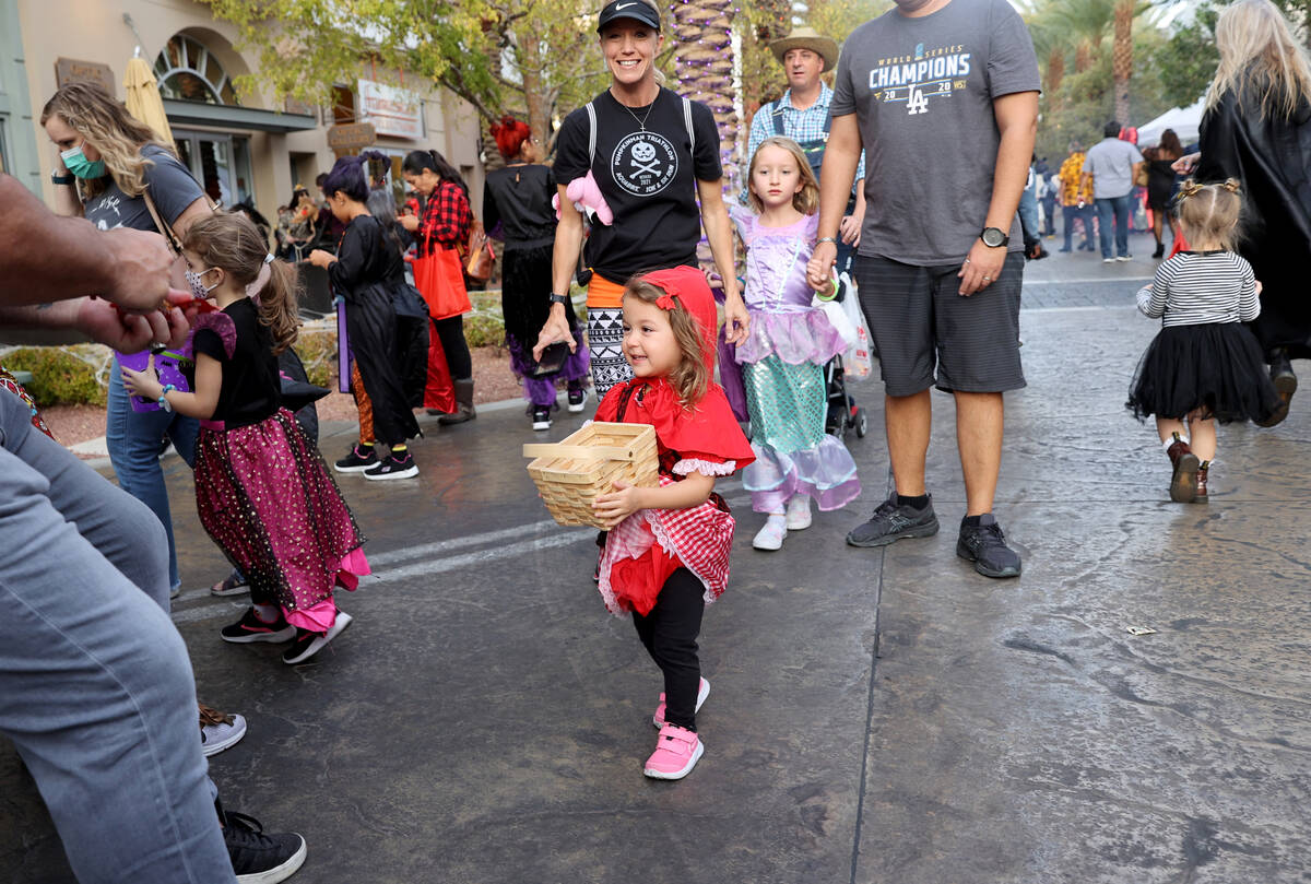 Carlee Benitez, 2, of Henderson during the Halloween Ghost Walk at The District at Green Valley ...