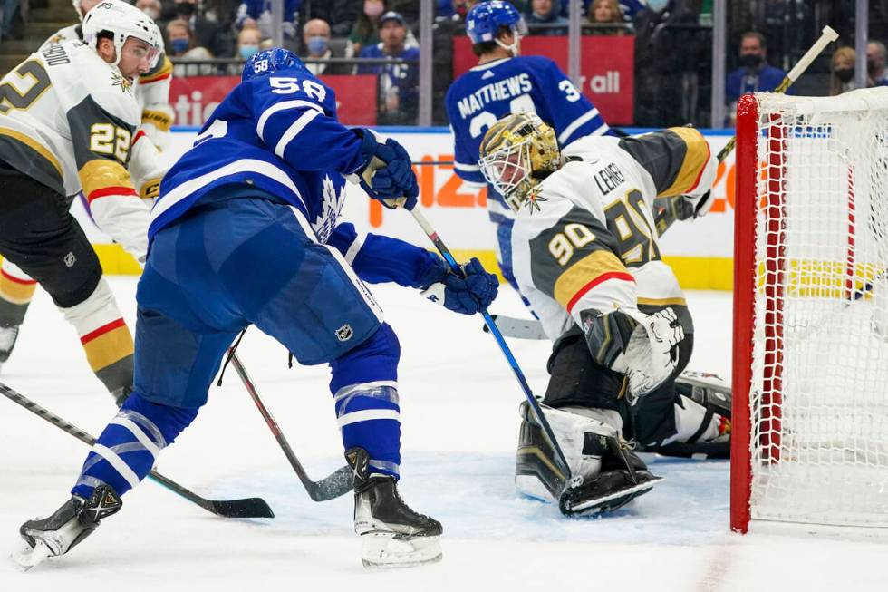 Vegas Golden Knights goaltender Robin Lehner (90) makes a pad save against Toronto Maple Leafs ...