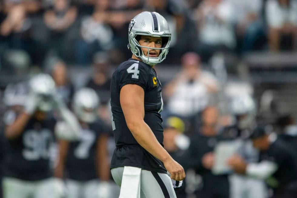 Raiders quarterback Derek Carr (4) looks on during the first quarter of an NFL football game ag ...