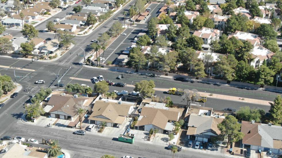 An aerial view of Las Vegas police investigating a fatal crash involving two vehicles at South ...