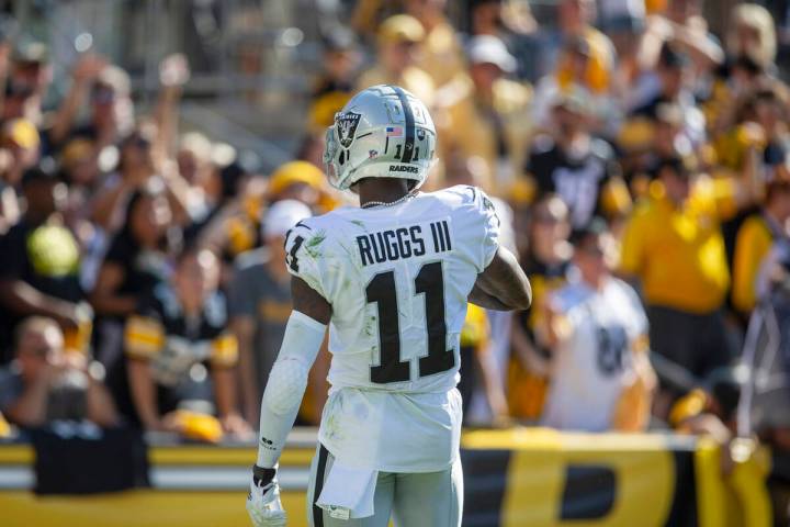 Raiders wide receiver Henry Ruggs III (11) runs into the end zone for a 61-yard touchdown durin ...