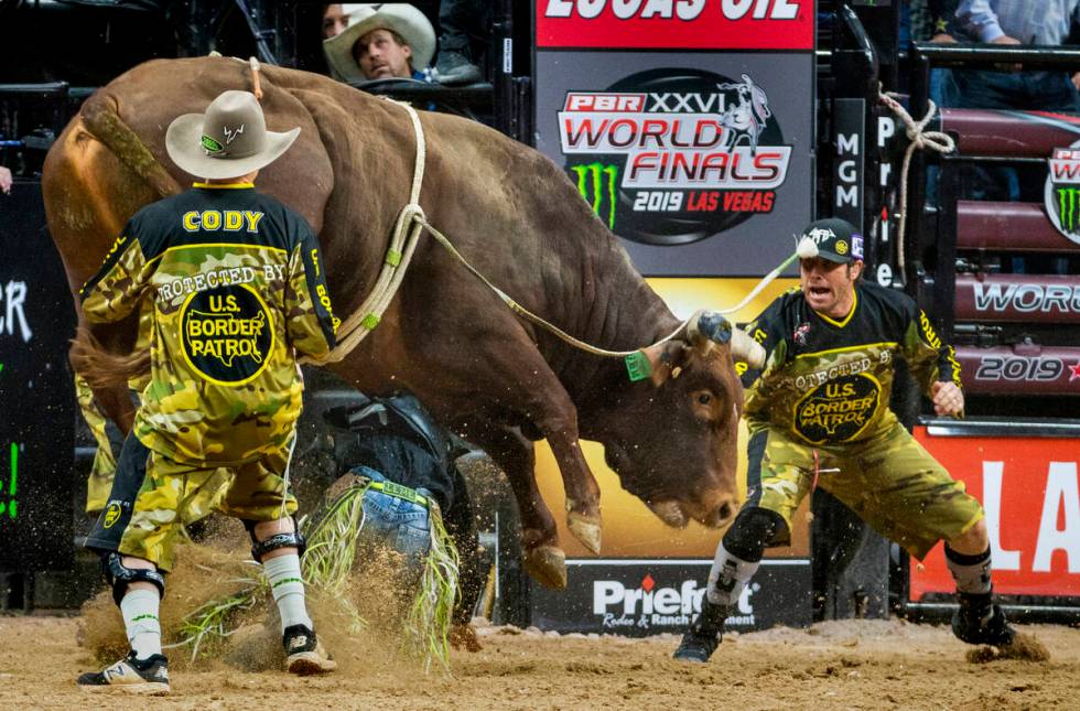 Jose Vitor Leme is pounded on beneath of Lil 2 Train during the last day of the PBR World Final ...