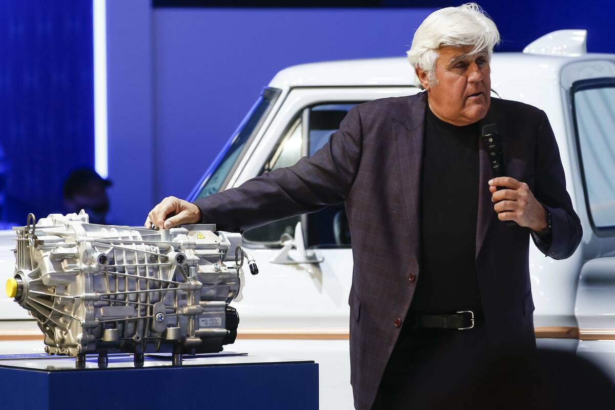 Jay Leno checks out the Eluminator electric crate motor during the Specialty Equipment Market A ...