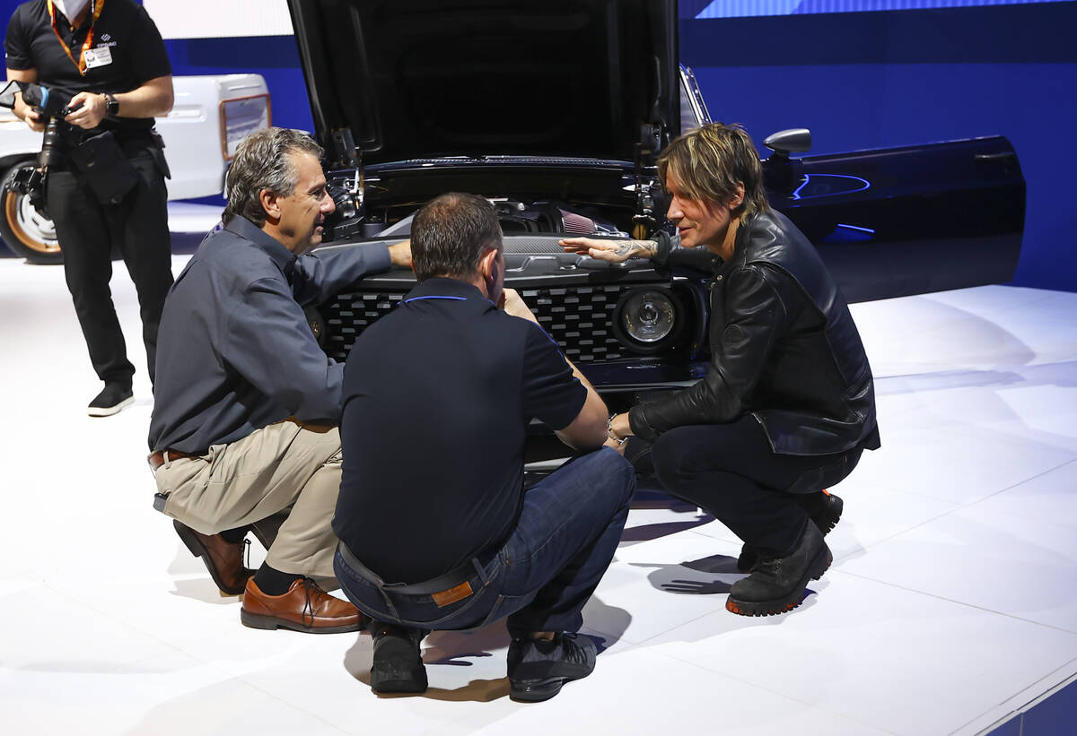 Country music star Keith Urban checks out his renovated 1969 Ford Mustang during the Specialty ...