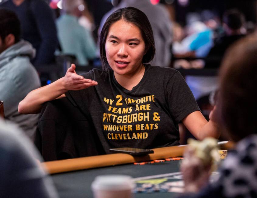 Lynne Ji of Los Angeles chats with other players at her table during Day 1A of the $10,000 buy- ...