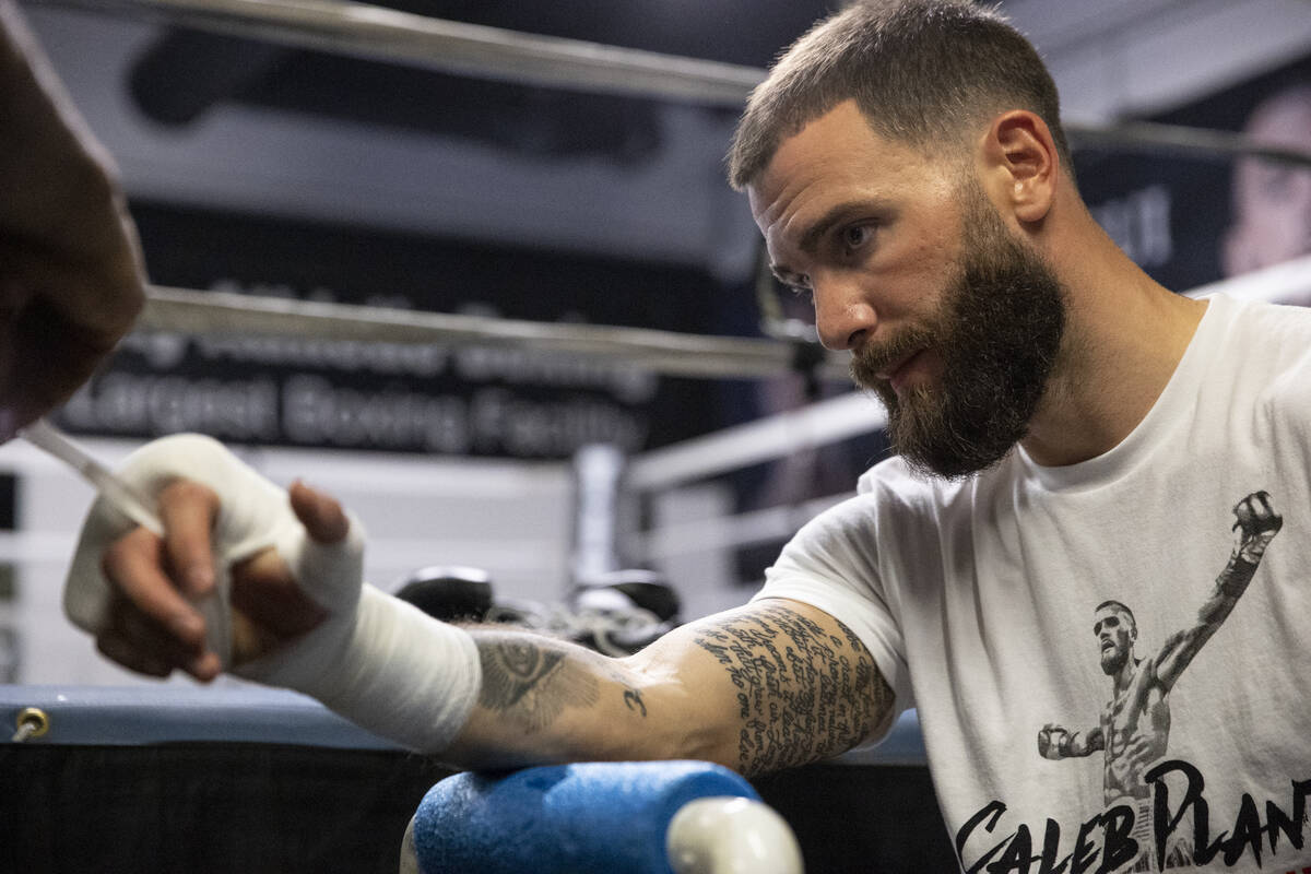 Caleb Plant gets his hand wrapped before a workout at City Boxing Club in Las Vegas in preparat ...