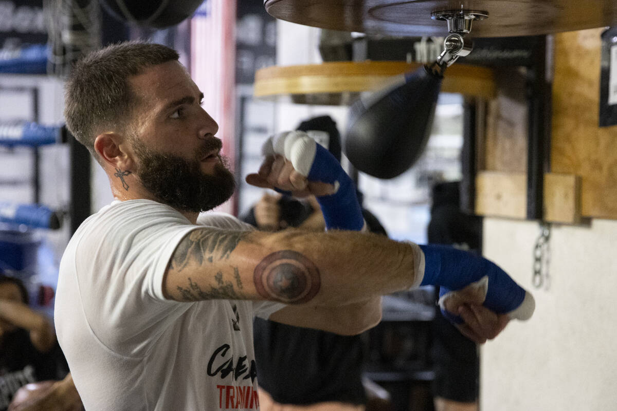 Caleb Plant hits the speed bag during a workout at the City Boxing Club in Las Vegas in prepara ...