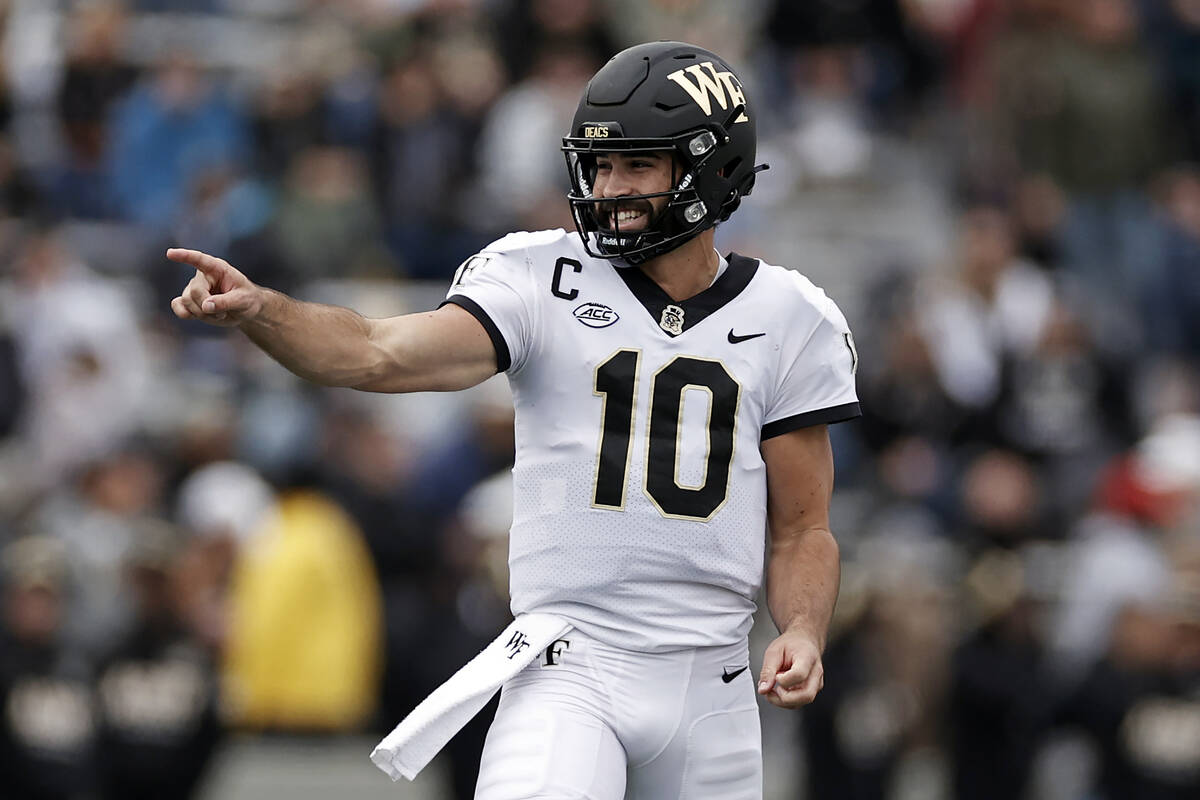 Wake Forest quarterback Sam Hartman reacts after a touchdown against Army during the second hal ...