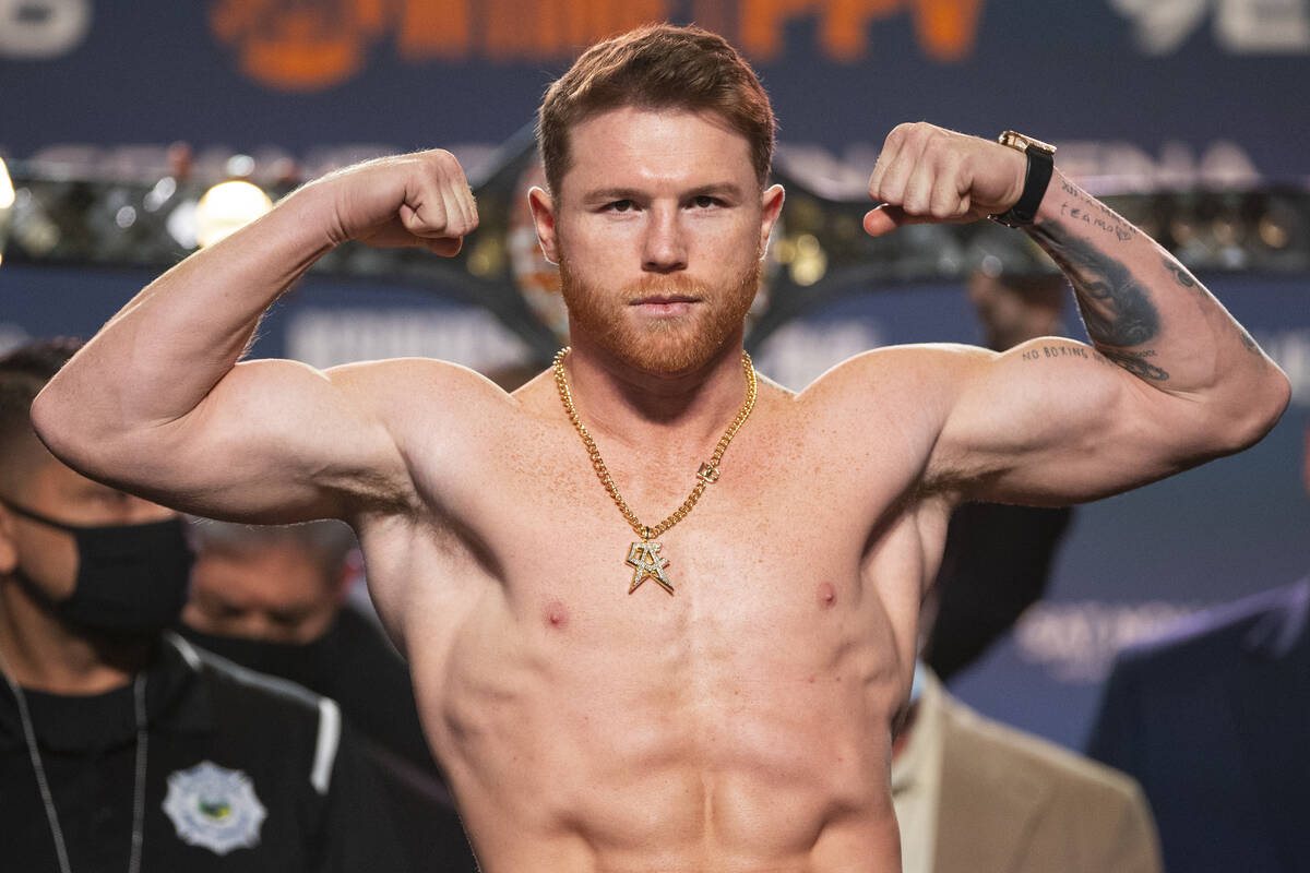 Canelo Alvarez poses during a weigh-in at the MGM Grand Garden Arena in Las Vegas, Friday, Nov. ...