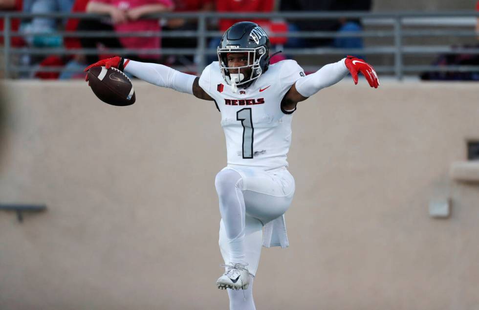 UNLV wide receiver Kyle Williams celebrates his touchdown against New Mexico during the first h ...