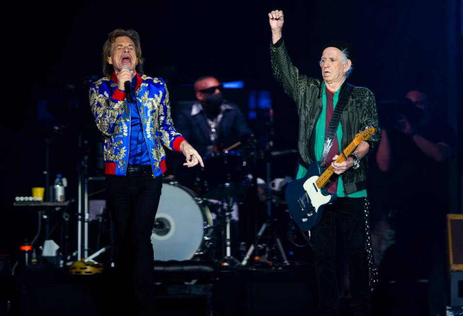 Mick Jagger, left, and Keith Richards of The Rolling Stones perform at Allegiant Stadium in Las ...