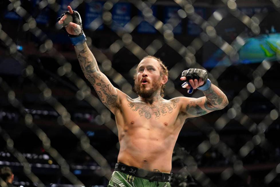 Marlon Vera reacts during a bantamweight mixed martial arts bout against Frankie Edgar at UFC 2 ...