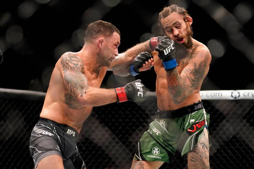 Frankie Edgar lands a punch against Marlon Vera during a bantamweight mixed martial arts bout a ...