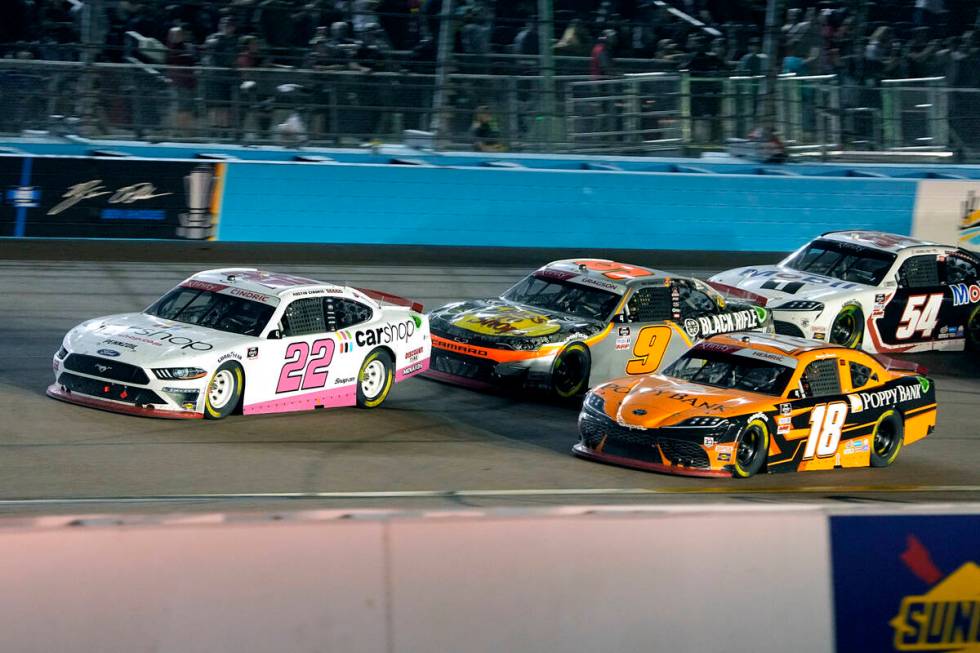 Austin Cindric (22), Noah Gragson (9), and Daniel Hemric (18) drive during the NASCAR Xfinity S ...