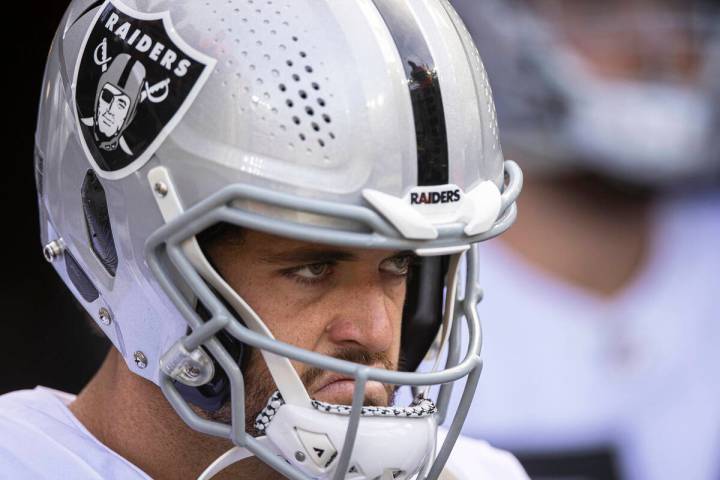 Las Vegas Raiders quarterback Derek Carr (4) gets ready to take the field before the start of a ...
