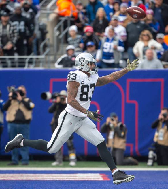 Las Vegas Raiders tight end Darren Waller (83) is overthrown in the end zone during the second ...