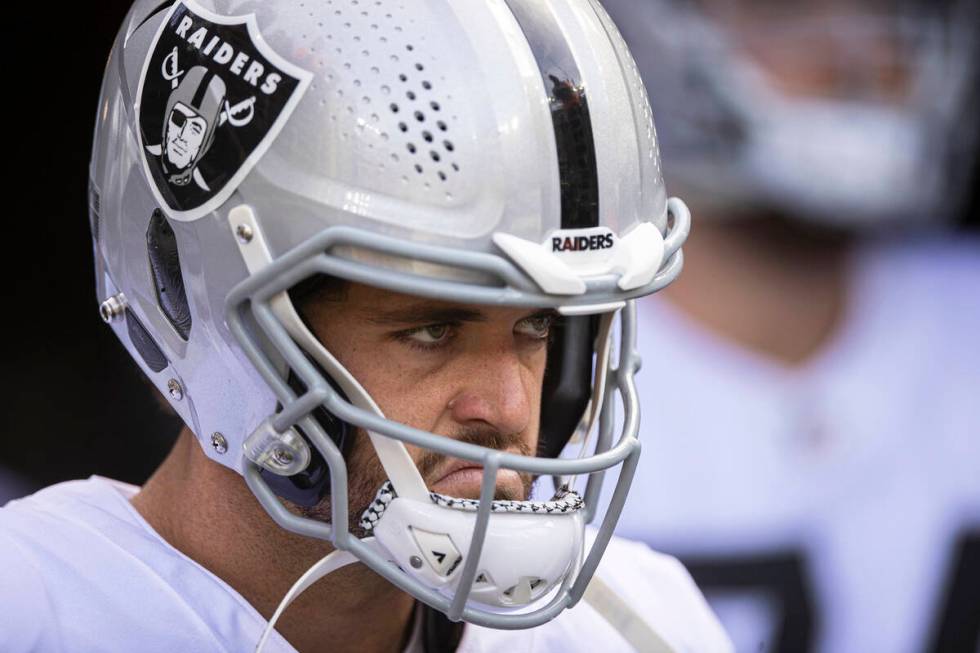 Las Vegas Raiders quarterback Derek Carr (4) gets ready to take the field before the start of a ...