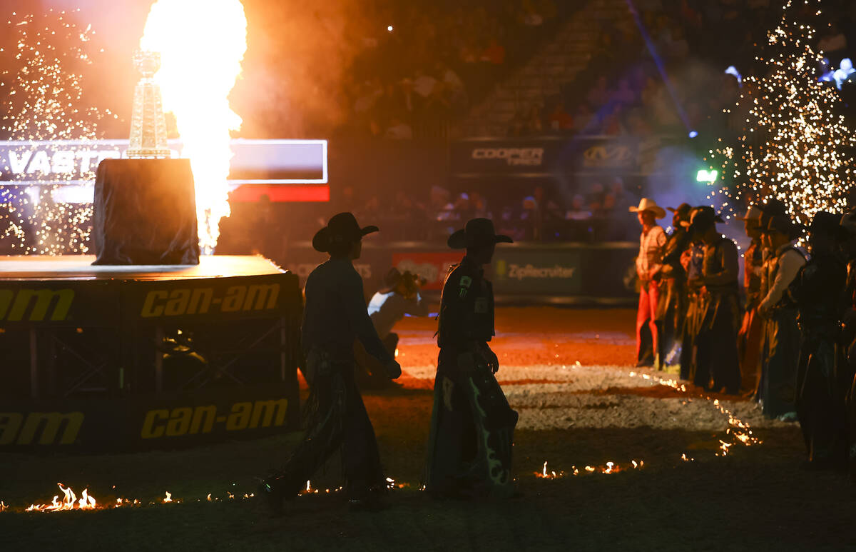 Riders are introduced during the Professional Bull Riders World Finals at T-Mobile Arena in Las ...