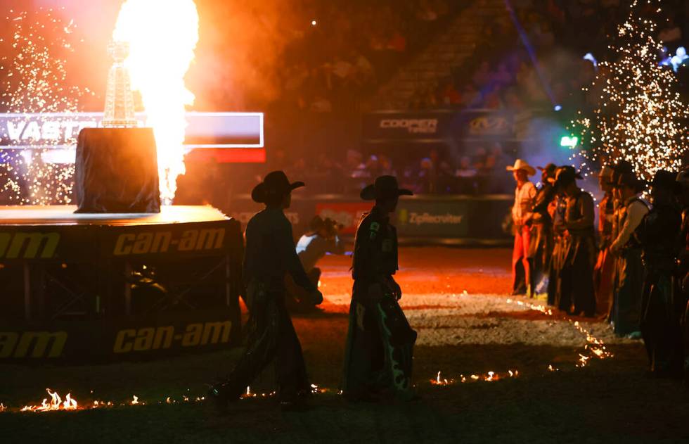 Riders are introduced during the Professional Bull Riders World Finals at T-Mobile Arena in Las ...