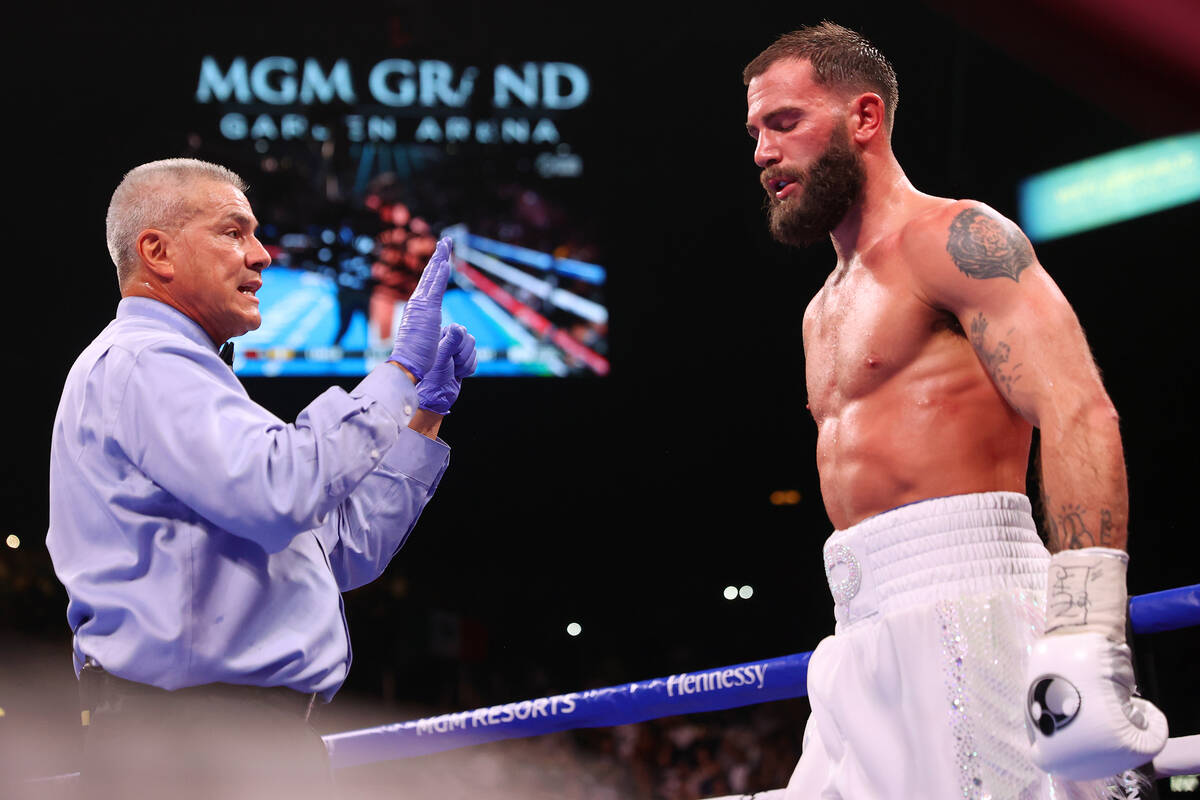 Caleb Plant gets a count after getting knocked down by Saul “Canelo” Alvarez in t ...