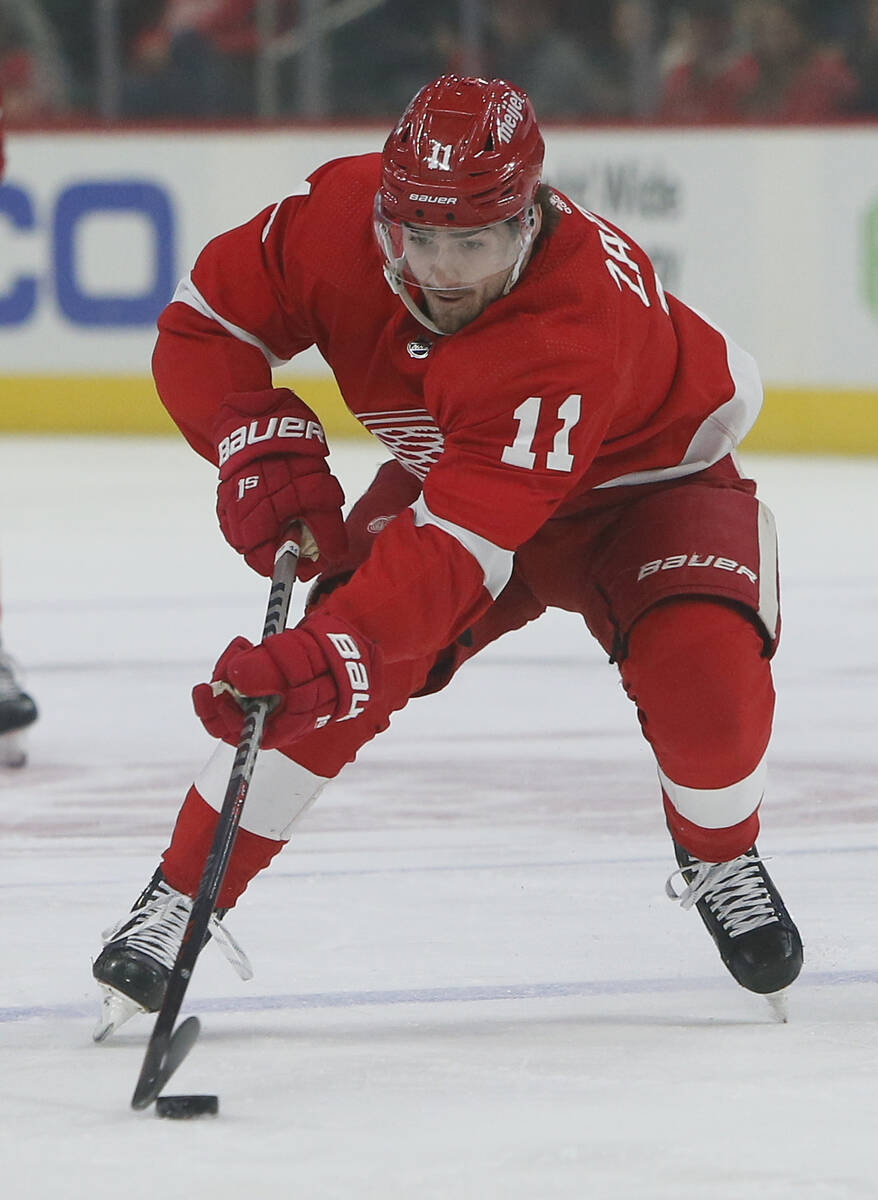 Detroit Red Wings right wing Filip Zadina (11) brings the puck down the ice against the Vegas G ...