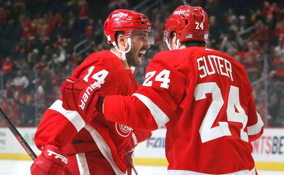 Detroit Red Wings center Robby Fabbri (14) celebrates with center Pius Suter (24) after scoring ...
