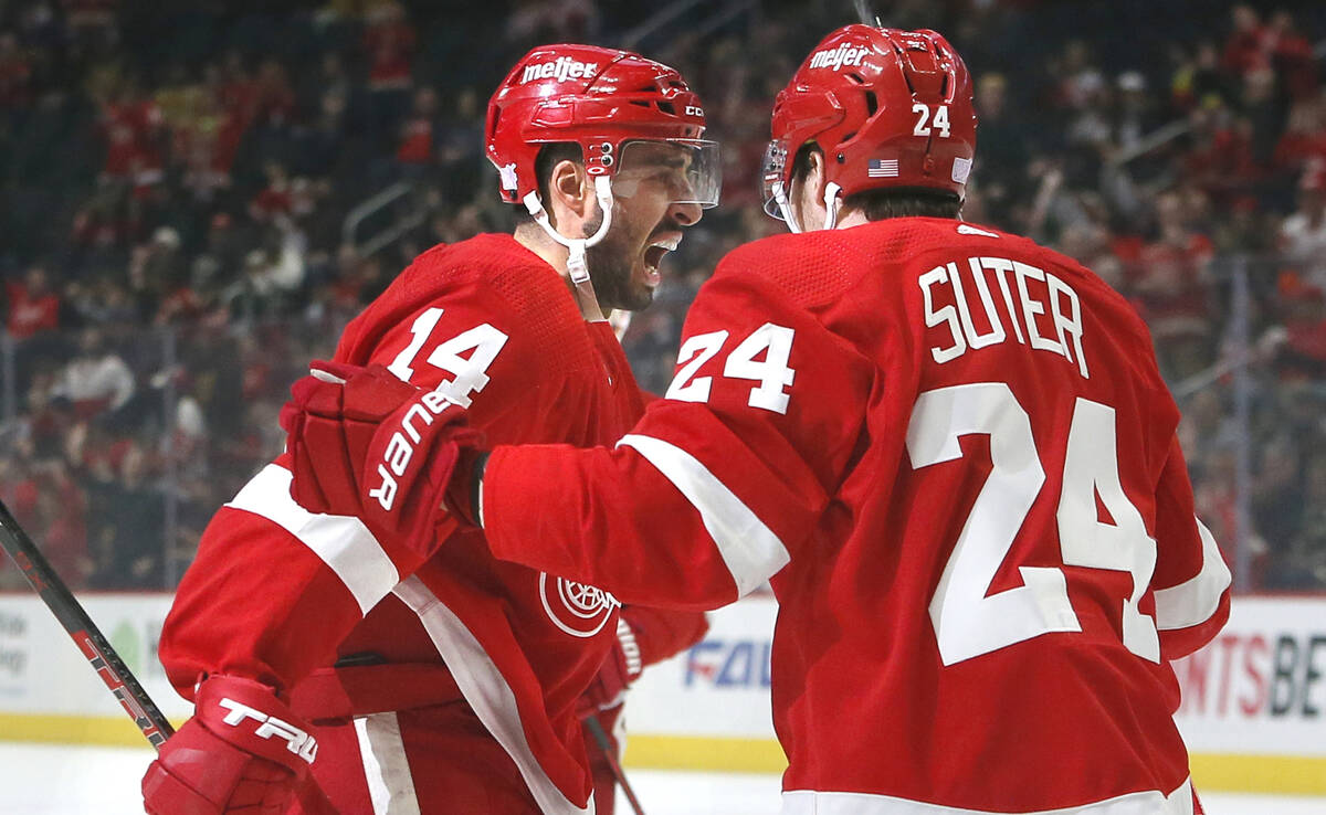 Detroit Red Wings center Robby Fabbri (14) celebrates with center Pius Suter (24) after scoring ...