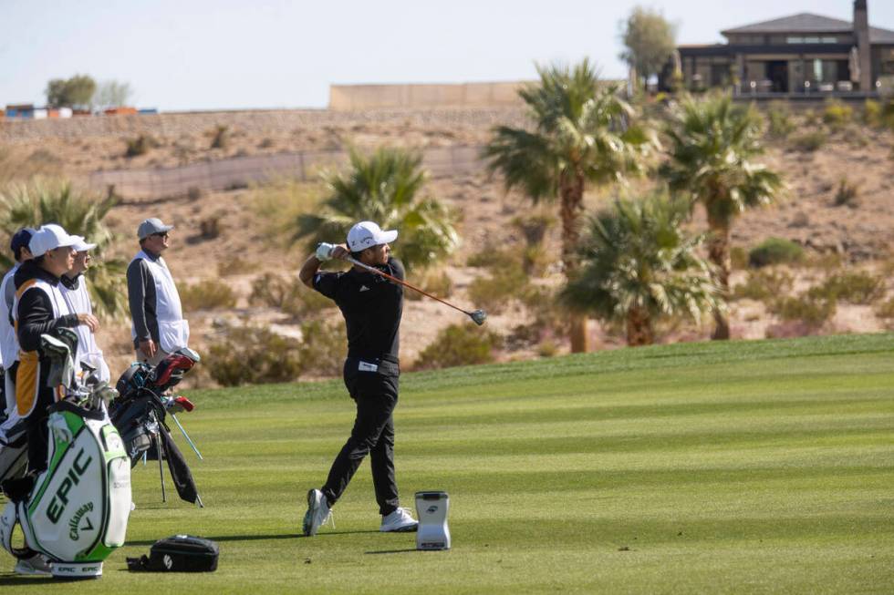 Xander Schauffele hits the ball from the fairway of the 18th hole during the CJ Cup Pro AM tour ...