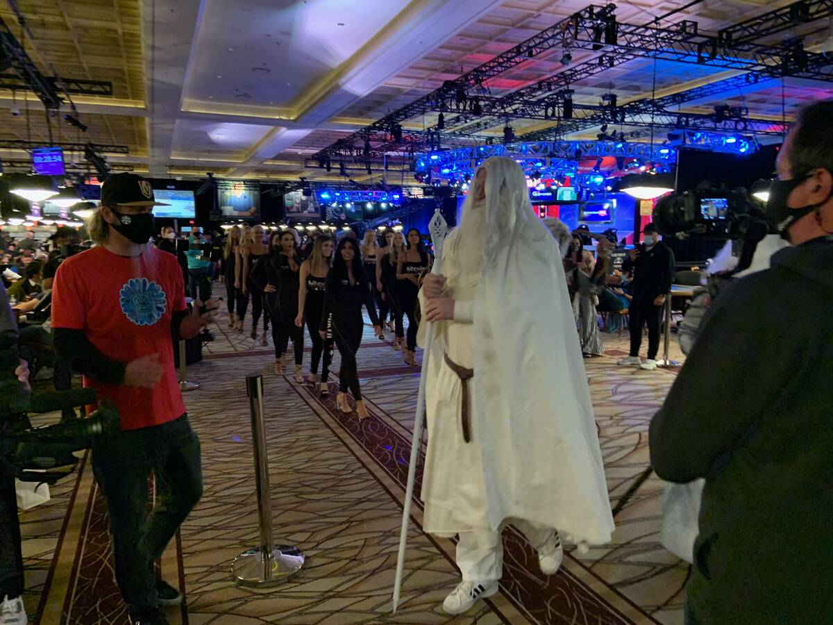 Phil Hellmuth arrives dressed as Gandalf the White from "The Lord of the Rings" on Day 1F of th ...