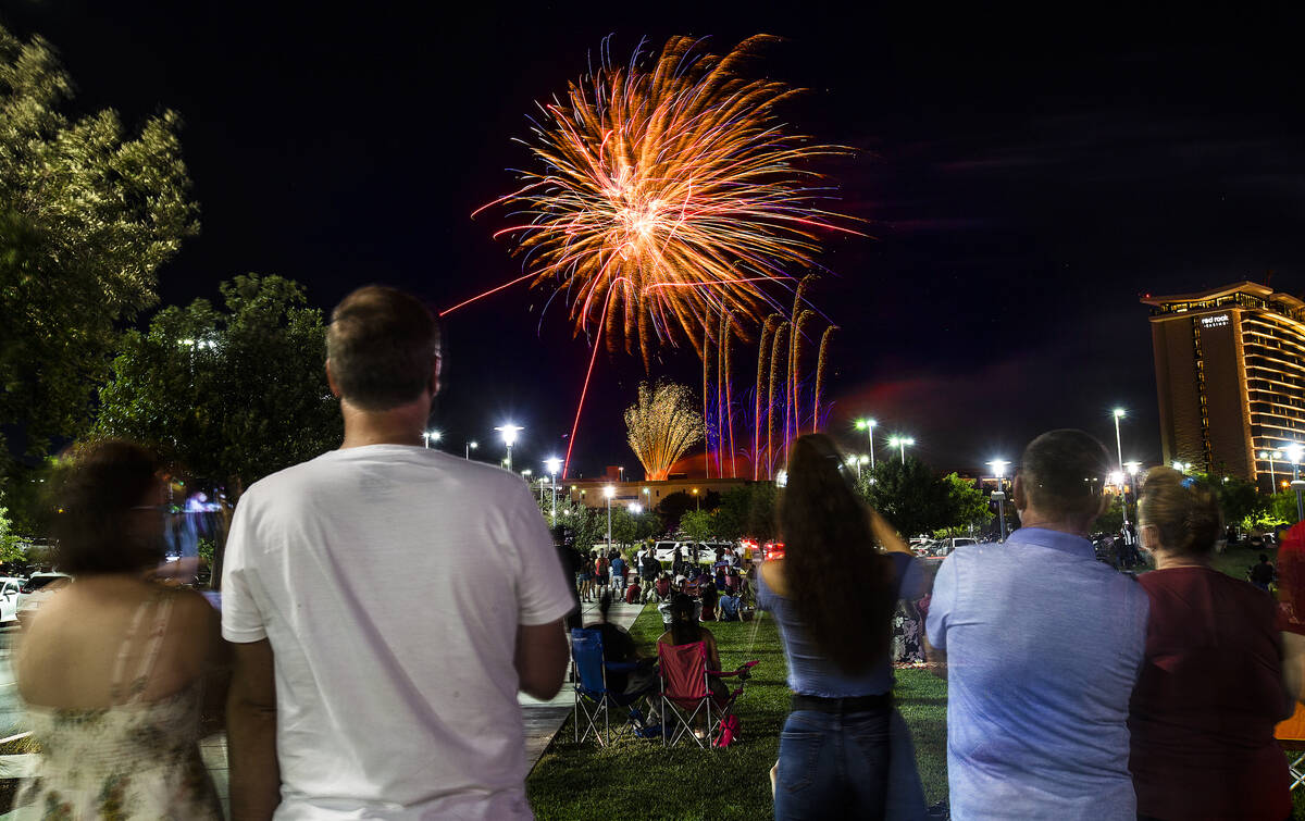 People watch the Red Rock Casino fireworks show from Downtown Summerlin on Saturday, July 4, 20 ...