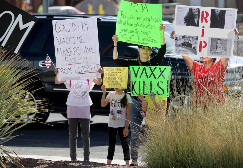 Protesters at Southern Nevada Health District in Las Vegas Wednesday, Nov. 10, 2021, as SNHD st ...