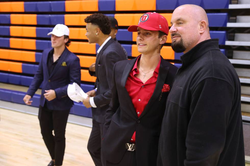 Payton Riske poses with his coach Gino DiMaria after signing a national letter of intent to pla ...