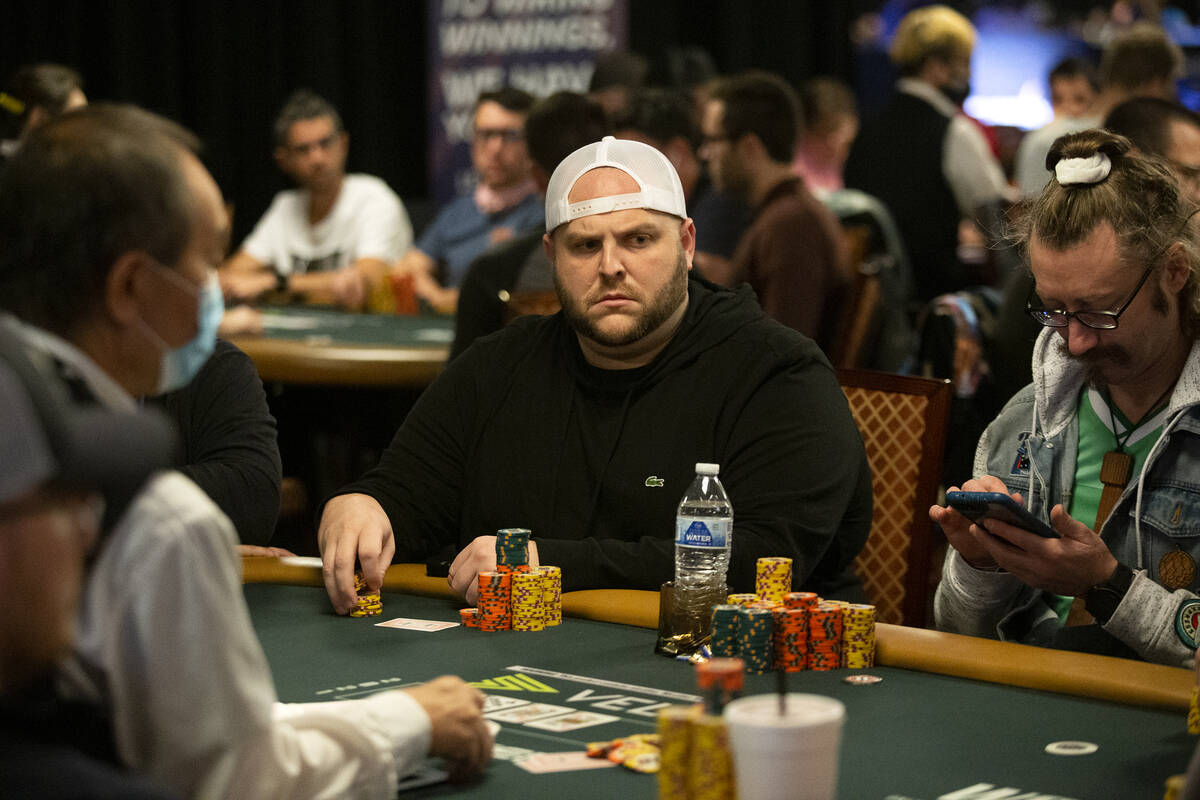 One poker player reacts to events on the table during the World Series of Poker Main Event at t ...
