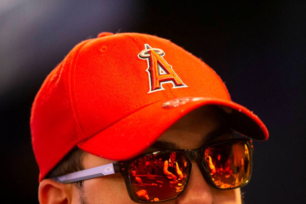 The table is reflected in one contenderճ sunglasses during the World Series of Poker Main ...