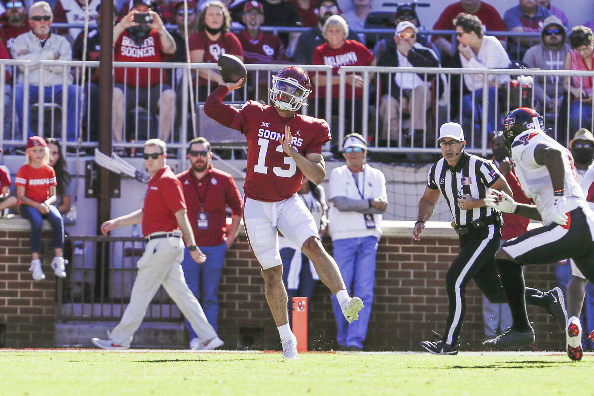 Oklahoma quarterback Caleb Williams (13) passes during the first half of an NCAA college footba ...