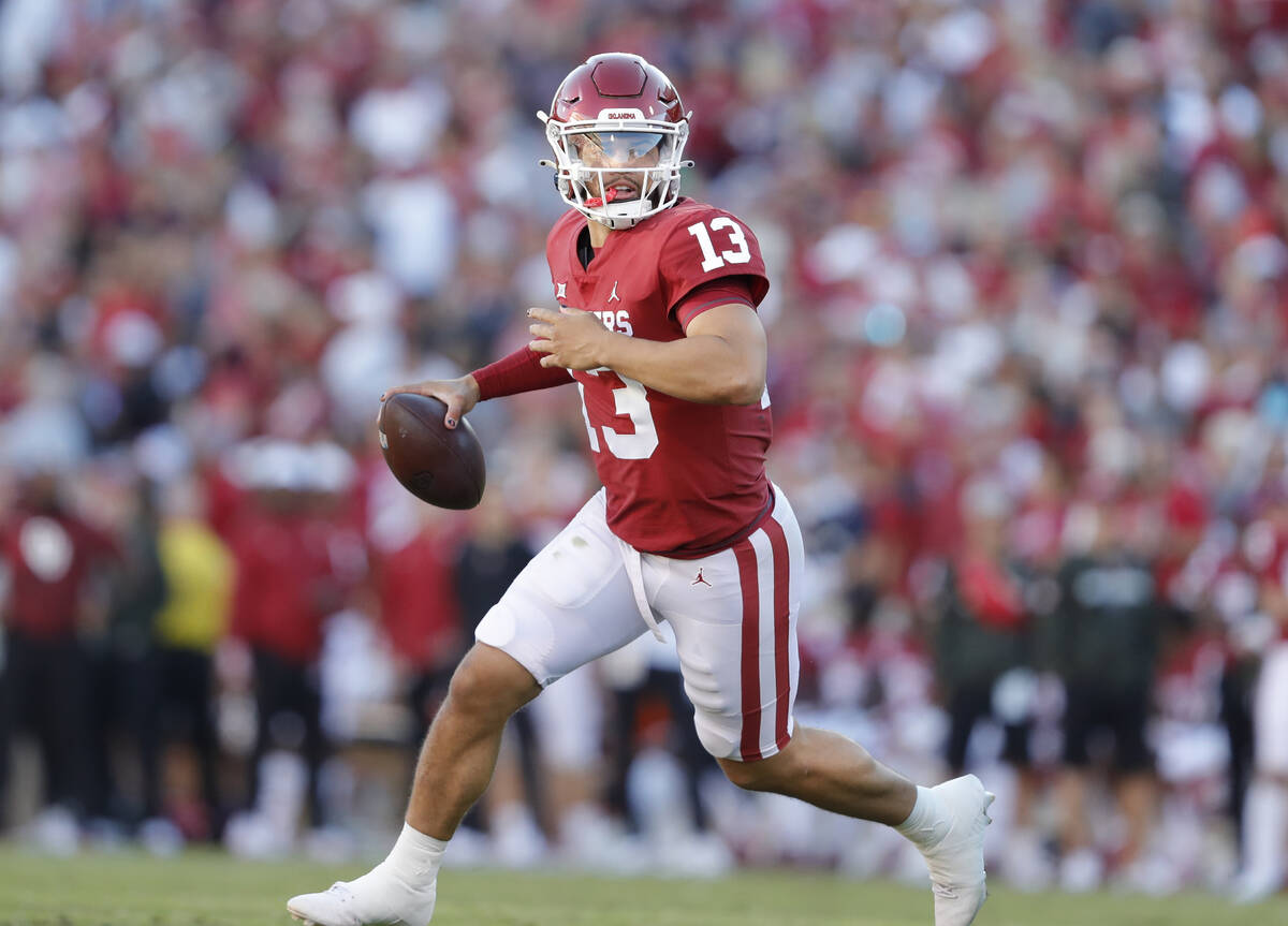 Oklahoma quarterback Caleb Williams (13) passes during the second half of an NCAA college footb ...