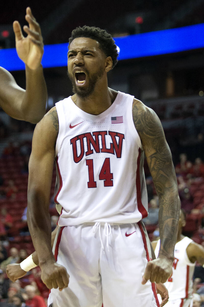 UNLV Rebels forward Royce Hamm Jr. (14) celebrates a scored point during the second half of a s ...