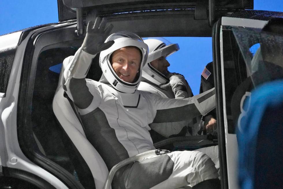 Astronaut Matthias Maurer, of Germany, waves as he gets into a car before a trip to Launch Pad- ...