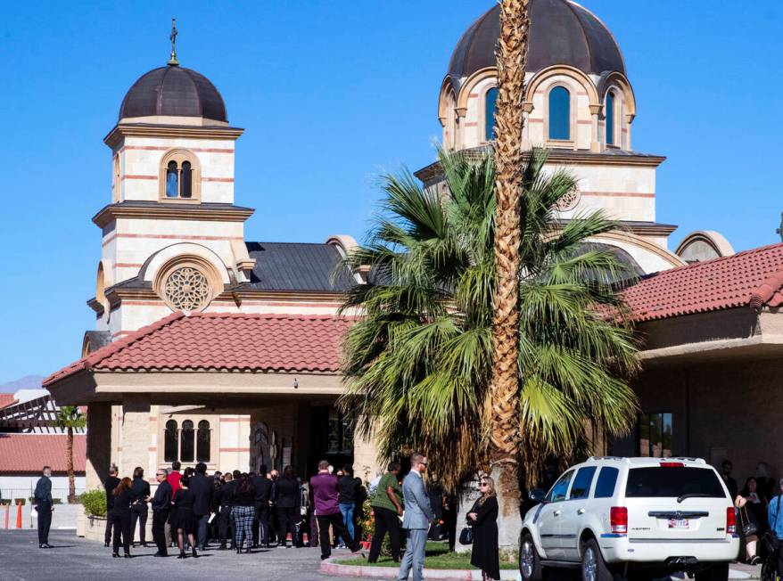 Mourners line up outside of St. Simeon Serbian Orthodox Church to attend Tina Tintor's funeral ...