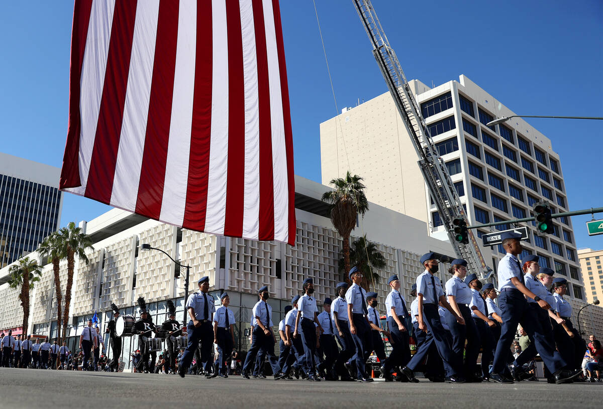 Rancho High School's junior ROTC participates during the Veterans Day parade on 4th Street in d ...