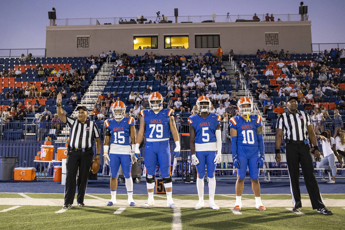 Bishop Gorman's Jeremiah-Joseph 'JJ' Bwire (15), Jake Taylor (79), Zion Branch (5) and Palaie F ...