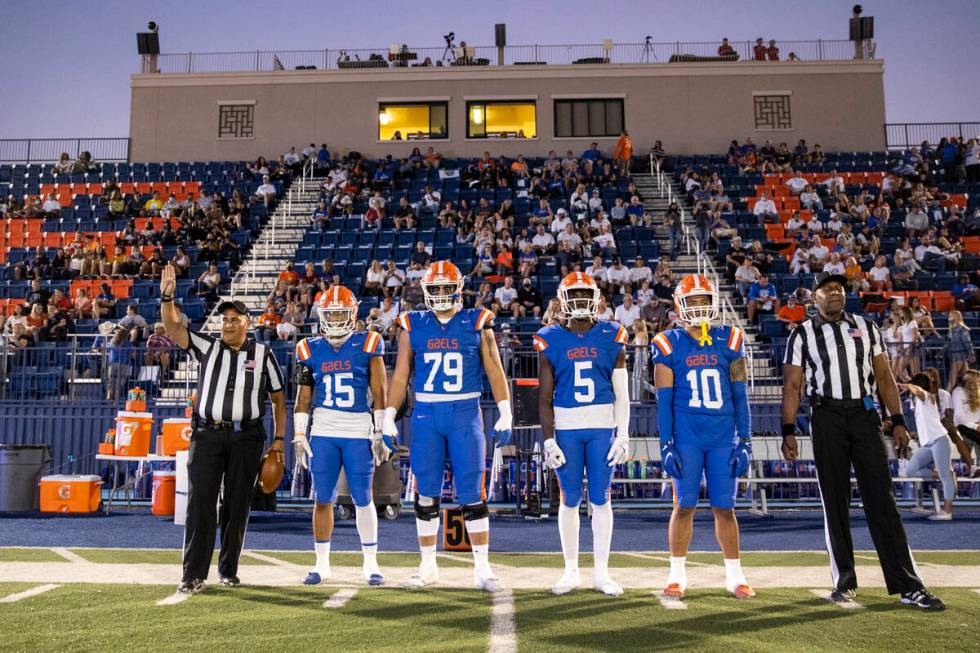 Bishop Gorman's Jeremiah-Joseph 'JJ' Bwire (15), Jake Taylor (79), Zion Branch (5) and Palaie F ...