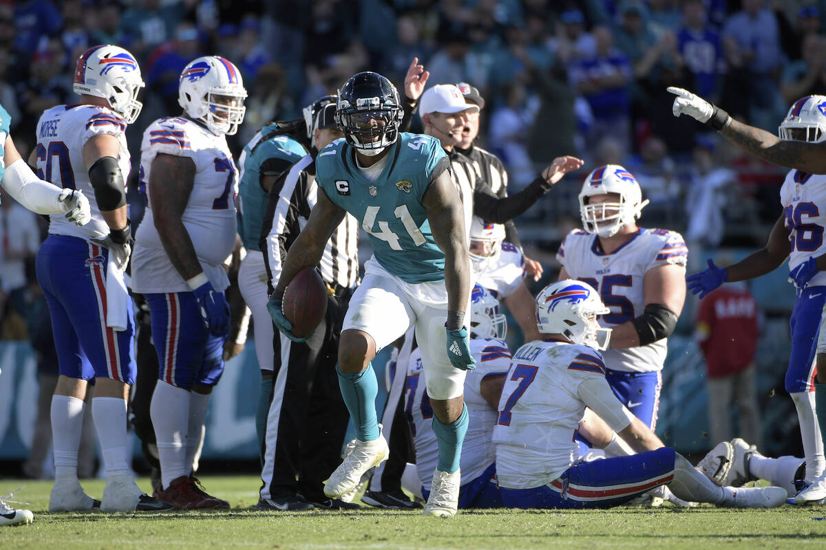 Jacksonville Jaguars outside linebacker Josh Allen (41) celebrates after recovering a fumble on ...