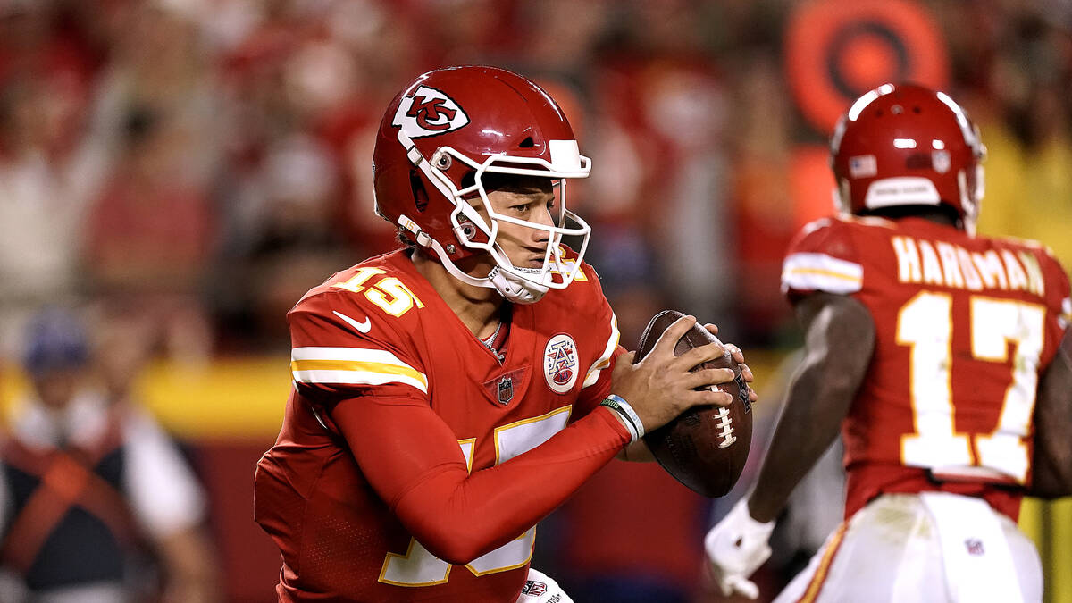 Kansas City Chiefs quarterback Patrick Mahomes (15) looks to pass during the second half of an ...