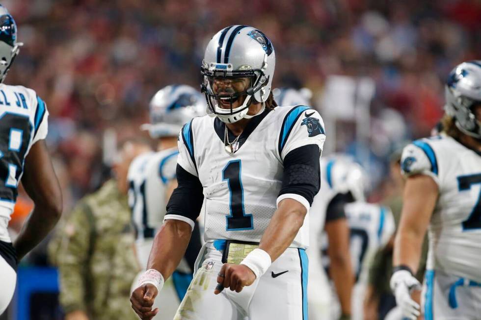 Carolina Panthers quarterback Cam Newton celebrates after a Panthers touchdown against the Ariz ...